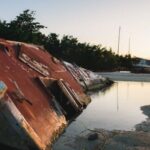 Sunken Ship - An Abandoned Boat on Water