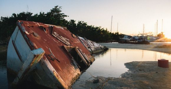 Sunken Ship - An Abandoned Boat on Water