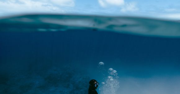 Diving Locations - Composite Photograph of a Diver Underwater