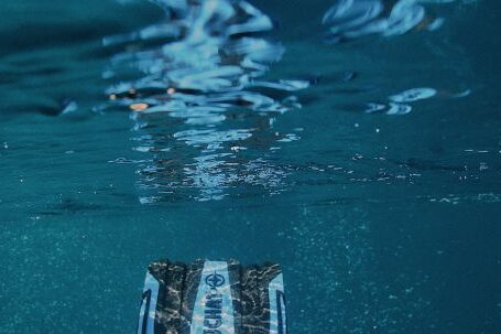 Diving - A Person Underwater Wearing Flippers