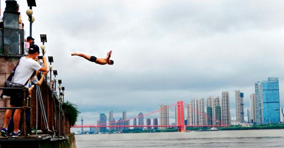 Diving - Man Diving on Body of Water