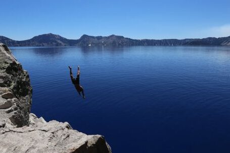 Diving - Photo of Man Diving in to Water