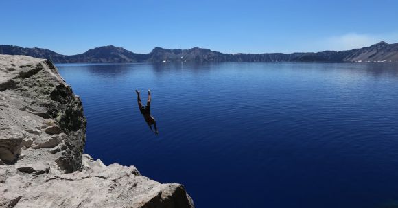 Diving - Photo of Man Diving in to Water