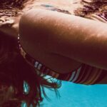 Underwater Camera - Woman in Blue and White Stripe Bikini Top in Water