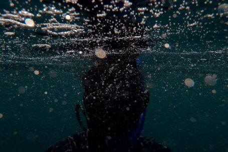 Underwater - A Person Underwater