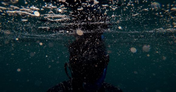 Underwater - A Person Underwater
