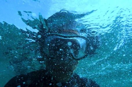 Diving - Photo of Person Wearing Swimming Goggles