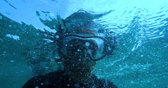 Diving - Photo of Person Wearing Swimming Goggles