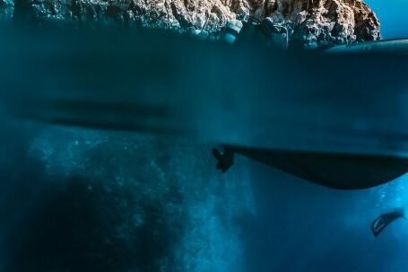 Diving - Blue Water Near White Rocky Mountain