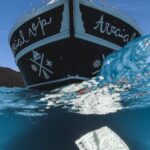 Diving Fins - A Boat on the Sea