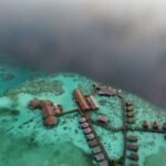 Shipwrecks For Diving - an aerial view of a resort on a tropical island