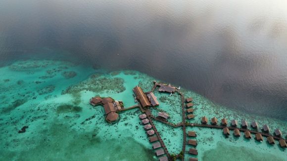 Shipwrecks For Diving - an aerial view of a resort on a tropical island