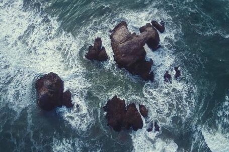 Diving Locations - Splashing Wave on Rock
