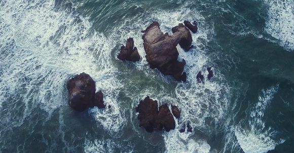 Diving Locations - Splashing Wave on Rock