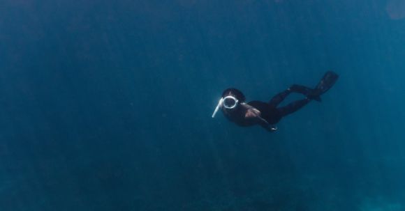 Diving Mask - Underwater Picture of a Man Diving